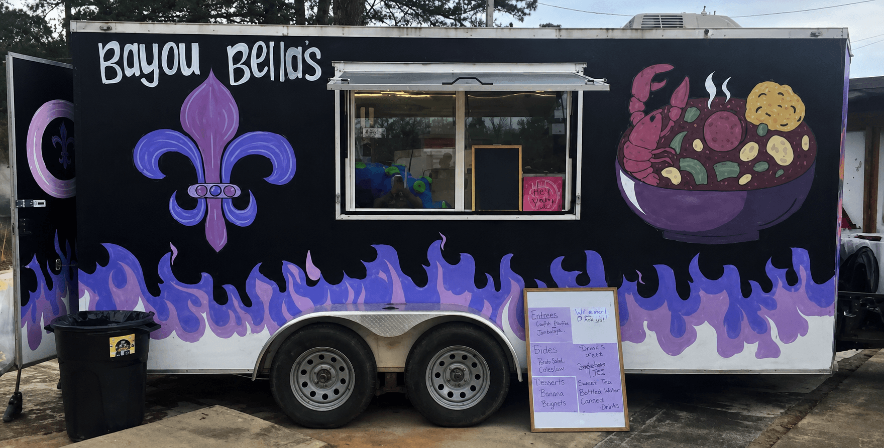 Purple and black Bayou Bella’s food truck